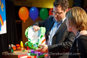 February 14, 2010 - New York, NY - Keri WIlmot from www.toyqueen.com at the Disney preview of Toy Story 3 in New York City gets shown some of the new toys for 2010 by one of the Disney executives